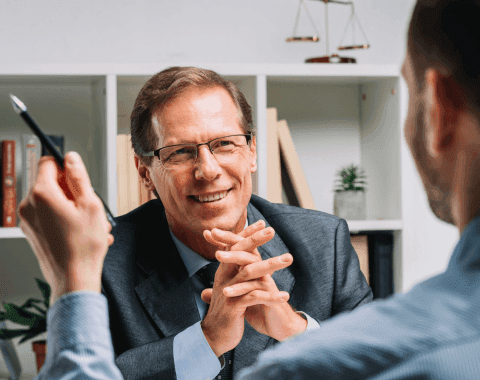 Mortgage attorneys talking in an office